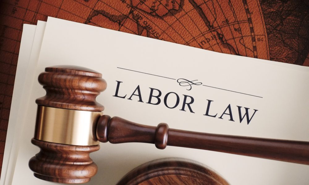 Gavel on labor law document