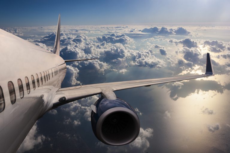 Body of an Airplane Flying Through Dark Clouds