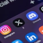 Social media applications X, instagram, LinkedIn, discord, reddit, Threads, Facebook on smart phone screen.